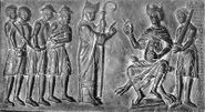 Адальберт Пражский обличает евреев, торгующих христианскими рабами, перед Болеславом II, герцогом Богемии. Рельеф с двери дворца в Гнезно (Польша).